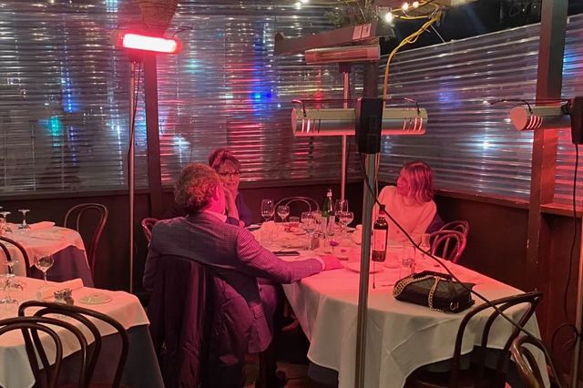 A photo of Sarah Palin dining at Elio's Wednesday night